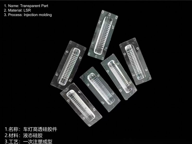 High-transparency LSR automotive lighting parts manufactured by Packson, featuring optical-grade liquid silicone rubber components produced through precision injection molding for vehicle headlight systems.